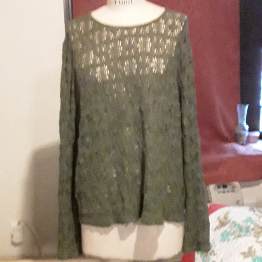 A blouse very lightly worn.  Great piece to have .